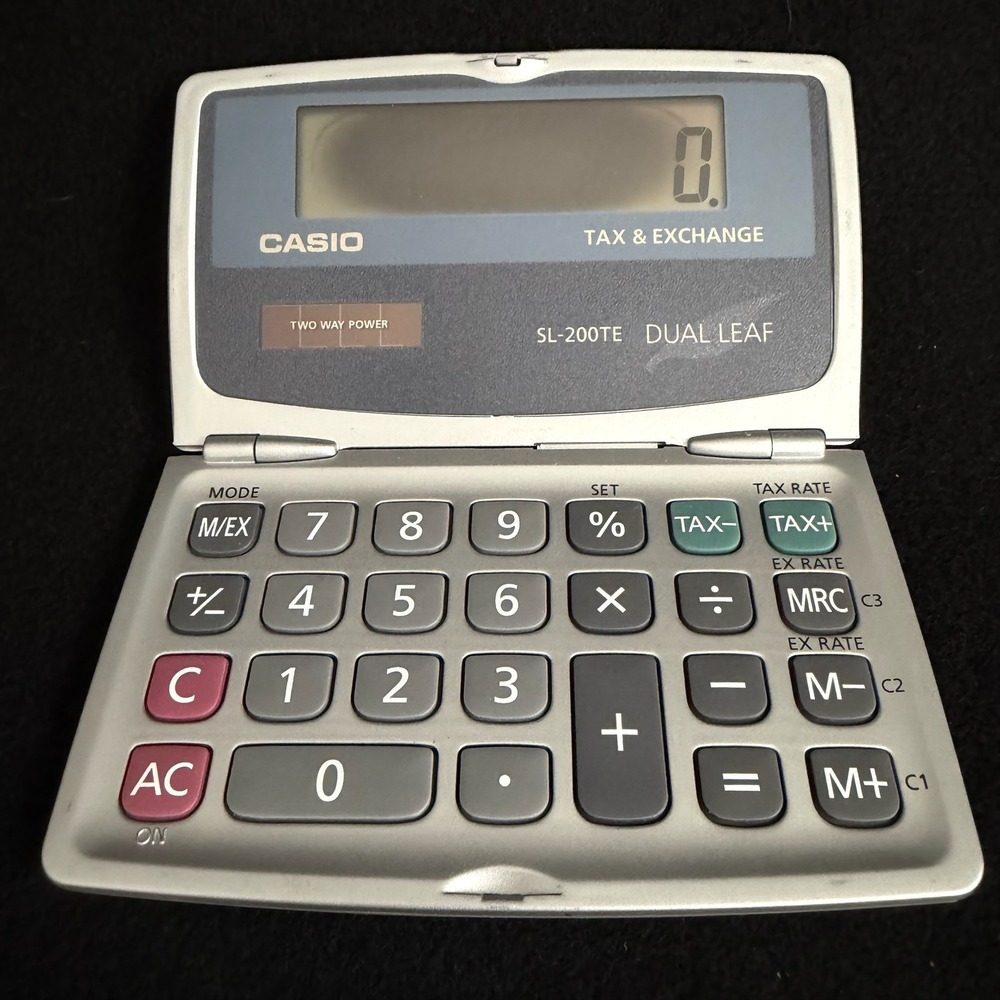 Casio SL-200TE Dual Leaf Folding Pocket Calculator Silver Tax Exchange Solar